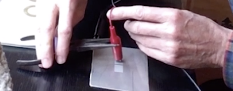 improvise a third hand with needle nose pliers
